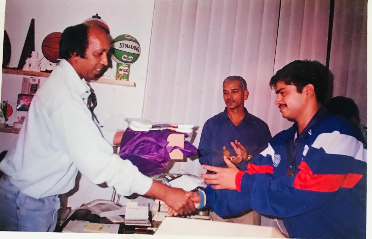 Handball player being congratulated