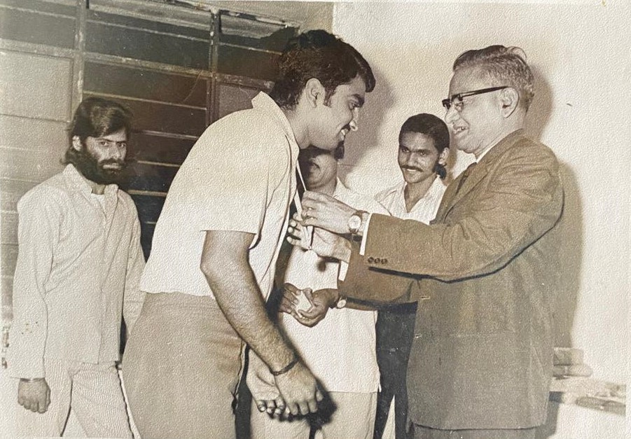 Shri Hanuman Singh Ji presenting an honor